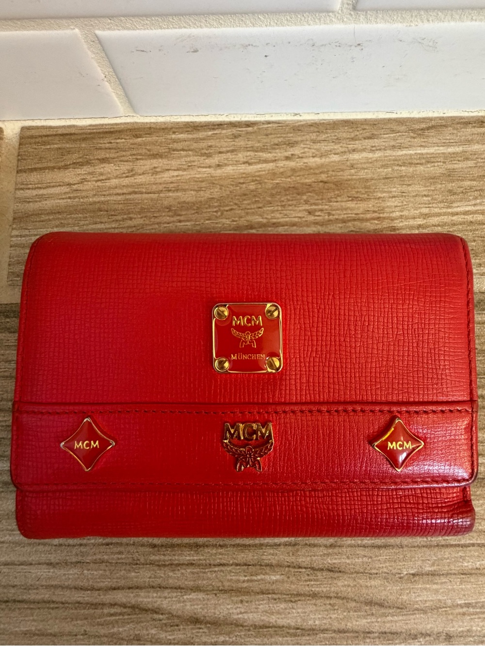 MCM Red Leather Wallet with Gold Logo Plates